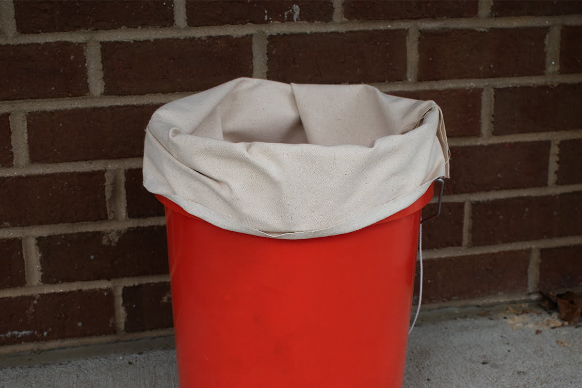 Asphalt Sample bag in a 10 gallon bucket